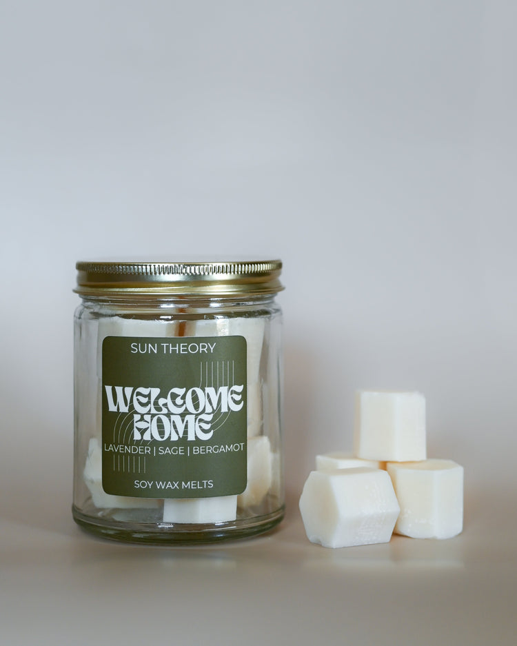 Jar of Soy Wax melts labeled "Welcome Home"