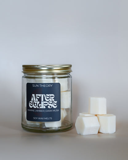 Jar of Sun Theory After Eclipse soy wax melts on a light gray background