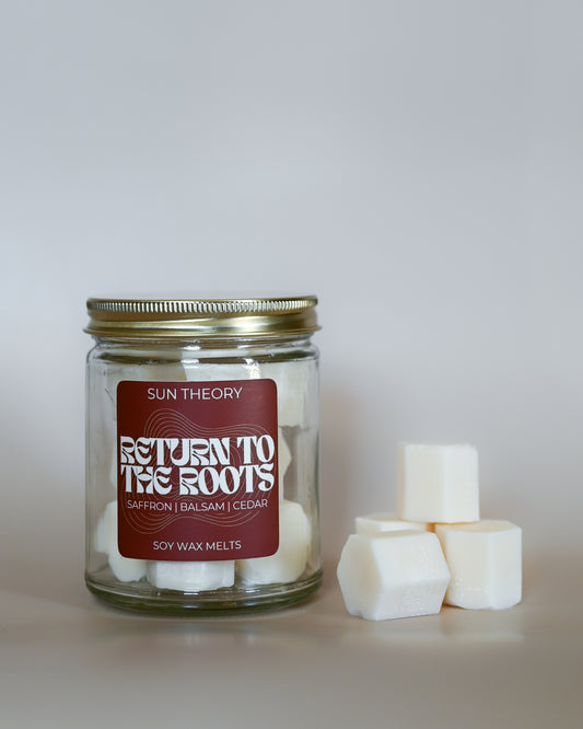 Jar of Sun Theory 'Return to the Roots' soy wax melts on a light background