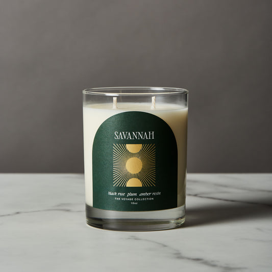 Savannah candle with a green label on a gray background